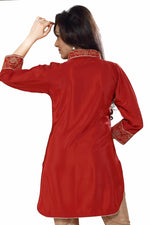 Rust poly crepe kurti tunic shown draped on a model