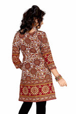 Maroon sari kurti tunic shown draped on a model