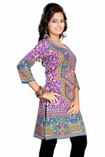 Lavender sari kurti tunic shown draped on a model