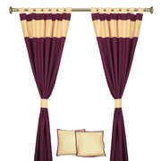 Maroon raw silk curtain and cushion cover set shown together