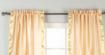 Misty rose sari rod pocket curtains hung at a window