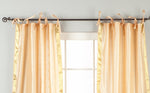 Misty rose sari tie top curtains hung at a window