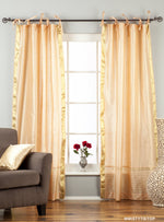Misty rose sari tie top curtains hung at a window