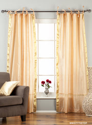 Misty rose sari tie top curtains hung at a window