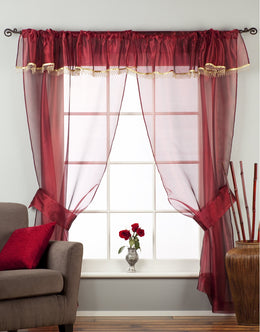 Maroon sheer tissue rod pocket curtains hung at a window