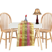 Art silk table runner running down a dining table