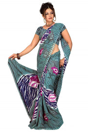 Georgette sari shown draped on a model