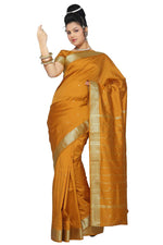 Mustard art silk sari shown draped on a model