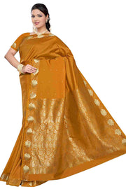 Mustard art silk sari shown draped on a model
