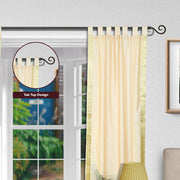 Cream sari tab top curtains hung at a window