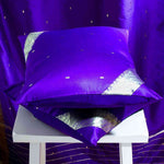 Regal purple sari cushion covers arranged on a sofa