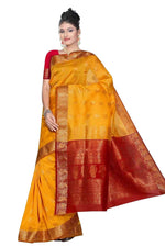 Yellow art silk sari shown draped on a model