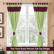 Olive green raw silk tab top curtains hung at a window