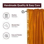Mustard sari rod pocket curtains hung at a window