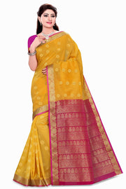 Yellow art silk sari shown draped on a model