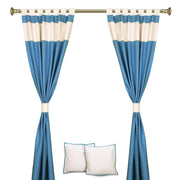 Turquoise raw silk curtain and cushion cover set shown together