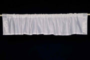 Silver sari valance mounted above a window