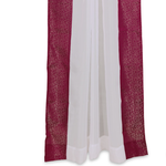 Maroon sheer tissue rod pocket curtains hung at a window